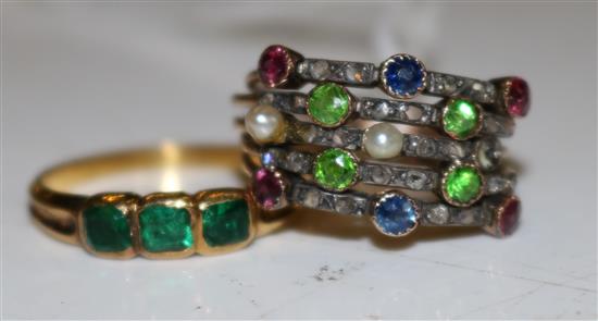 Emerald ring with 3 square stones in rubover settings & a multi gem-set ring on five-wire shank (both unmarked)